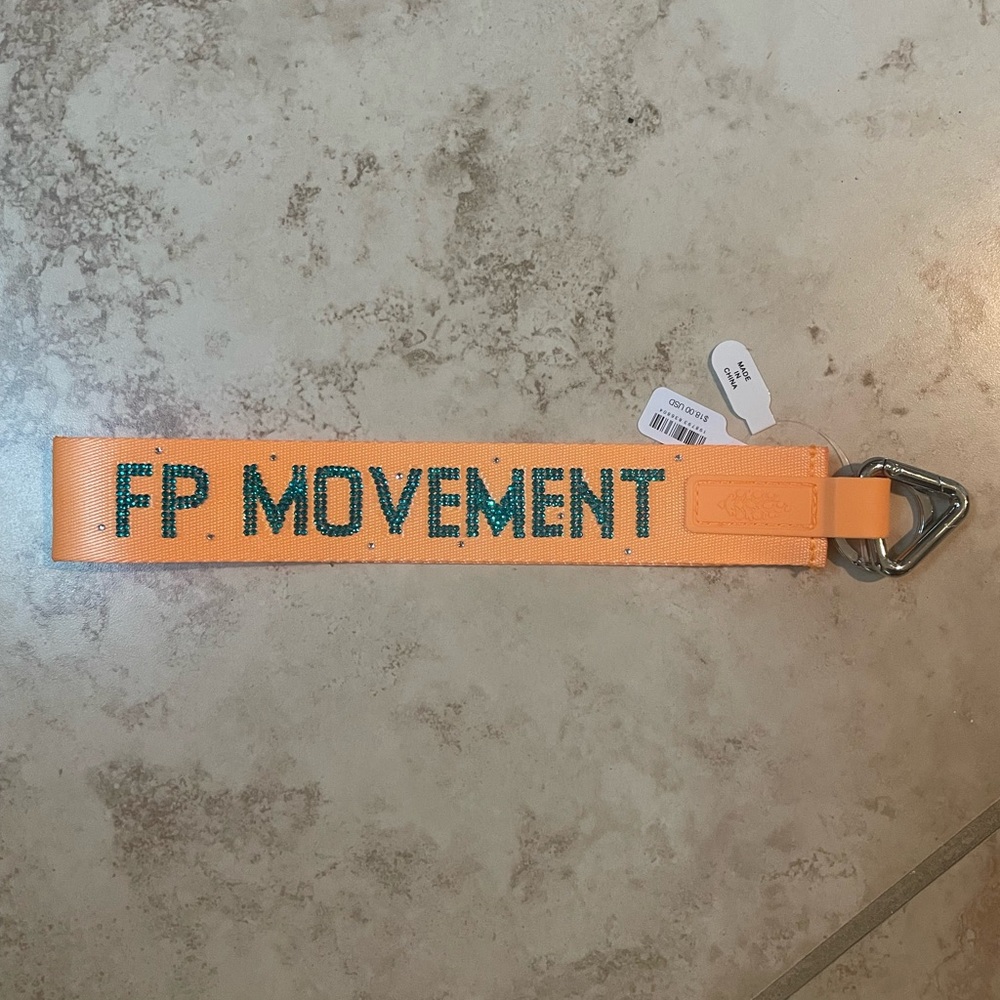 Custom Free People Movement there it is keychain orange and teal